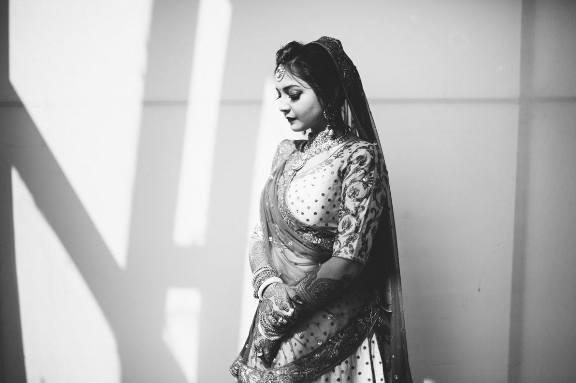 Indian bride poses, black and white
